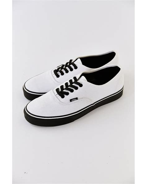 white sneakers black sole|black trainers white sole men's.